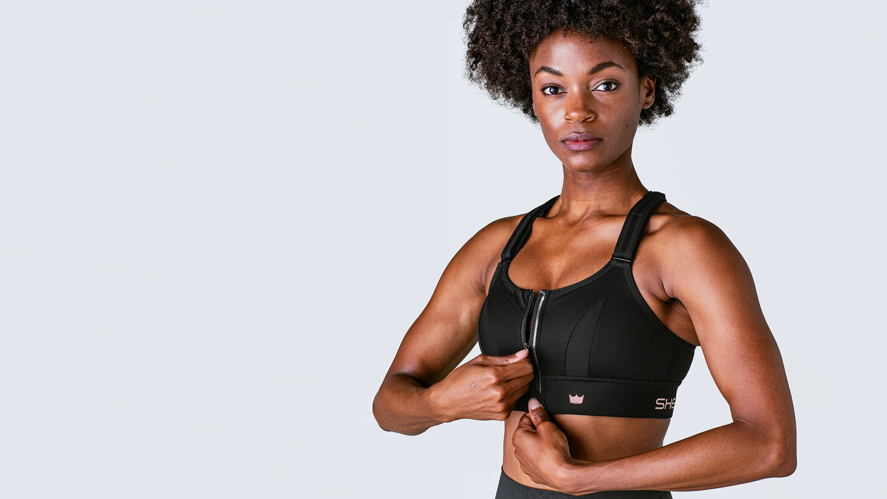 SHEFIT® Ultimate Sports Bra - Confident. Out Now!